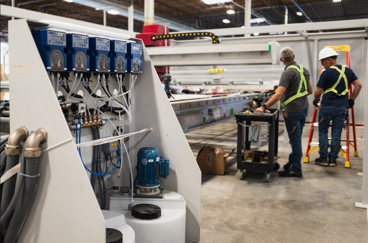 Precision engineering equipment with technicians